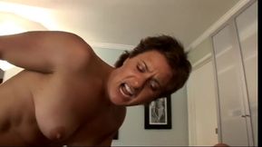 Muscled woman moans as a huge cock bangs her wet holes indoors