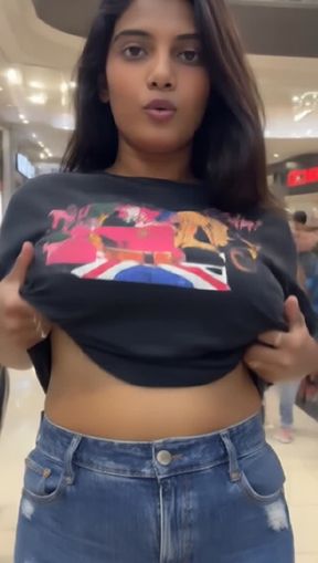 titty drop, a young, black Haired pakistani, video created by AI