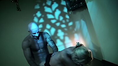 As the blonde milf gets up the stairs her big tits get grabbed by the vampire