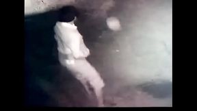 Guy pissing  by caught camera