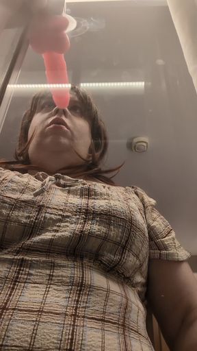 Kelli completes her Deep throat training at an open window
