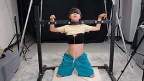 Chinese Bondage 105 - Cute Chinese girl is tied to a steel frame and uses a vibrator to play with her boobs