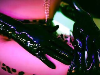 Latex Mamma Dominant-bitch Penny Barber Lubes Up Her Bazookas and Twat