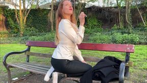 Liz Rainbow Smoking a Flor De Oliva Cigar Outdoors