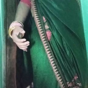 Indian Gay Crossdresser Gaurisissy in Green Saree Pressing Her Big Boobs and Fingering in Her Ass