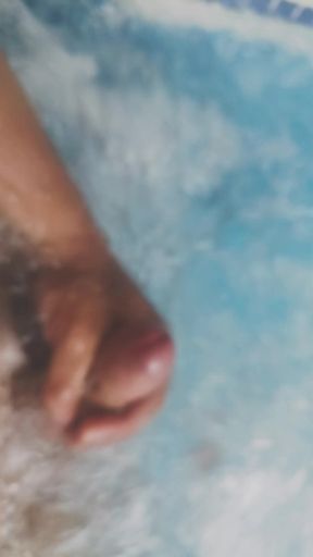 Cumshot in the hotel pool