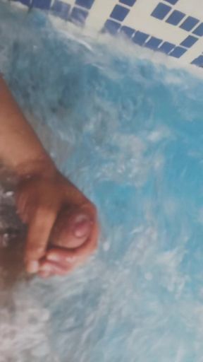 Cumshot in the hotel pool