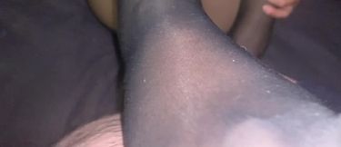 Footjob in Sheer Black Stockings and on Her Pantyhose
