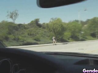 Shemale hitchhiker Crystal M gets picked up by a driver and returns the favour by sucking his dick in the car and then going for an anal ride!