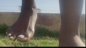 Rowanie stomping on grass with bare feet