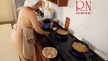 Nudist housewife Regina Noir cooks at the kitchen. Naked maid. Naked housewife. s3