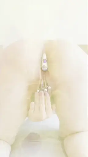 Aaruna, in her high heels and butt plug, takes on the role of a