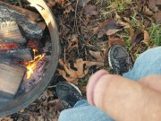 Putting out a fire at the campsite by pissing on it