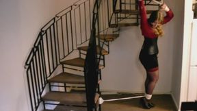 0012 - Corseted damsel tied to spiral staircase