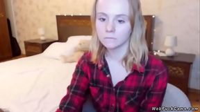 Blonde amateur teen strips off her stockings and flashes boobs in black