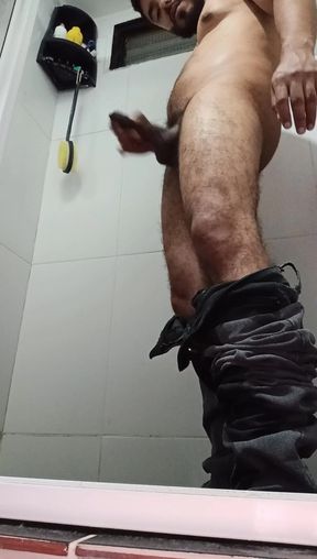 Urinating in Dark Jeans