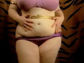 Watch this vintage exotic dancer with huge tits and ass pleasure herself with masturbation and fetish play