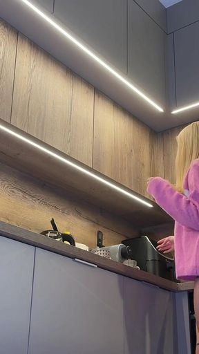 Iconic moment from &quot;Hot petite skinny blonde girlfriend is in the kitchen teases me with her pink pull over&quot;