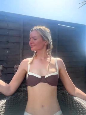 Braided Blonde Teases in Brown Bikini by the Pool