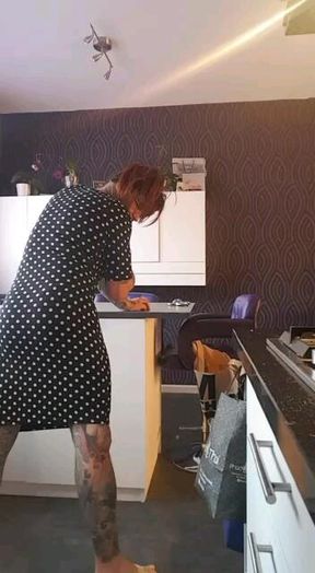 Wooden spoon spanking in the kitchen