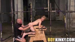 ”Mature master Sebastian Kane stretches his twink slaves booty”