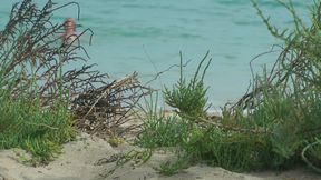 Watching on the beach as Isa has fun