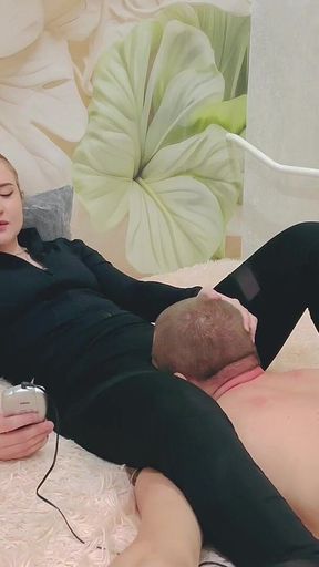 Electrical Stimulation of the Penis of a Tied Slave