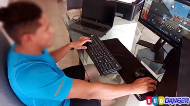 Red-haired stepdaughter interrupts her stepdad's gaming session with a bold move