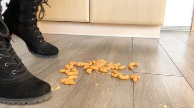 Erdnussflips crushed under Angel’s pedal as her sexy boots wreck them
