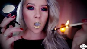 Gold lips on a black 120 cigarette