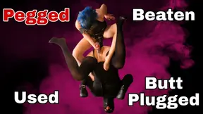 Ballbusted and buttplugged femdom slave gets pegged