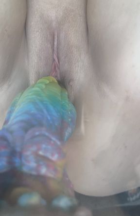 Me with a big, colorful, crazy-looking dildo.