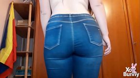 Big ass walking in blue jeans