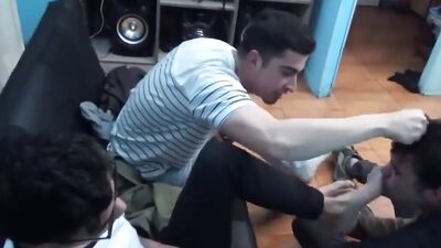 Submissive twink dude is worshipping feet and toes of two dudes