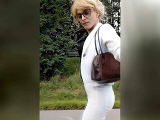 Tranny Wetting in hot white jeans !! Pissed in full public!