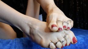 Worship my perfect feet in red toenail polish and toe rings