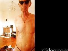 Watch this hot guy in glasses and a mask get down and dirty with his man's dick