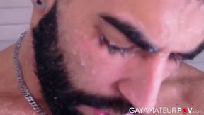 Inked muscular Yah Jil soaps up his muscular body and plays his long uncut thick dick