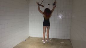 Lola is bound and gagged in an abandoned hospital