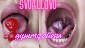 Swallow aliens gummy bears in