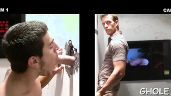 Hung hunk gets his cock sucked through a gloryhole