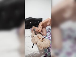 Concupiscent college angel pleasures her vagina with sex tool and teddy bear