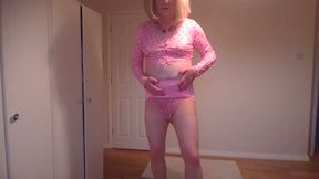 Pink pyjama top, miniskirt and nude pantyhose