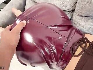 A brunette hair with a large booty put on a shiny leather petticoat so that a chap would screw her in the butt after a date.