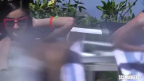 Blue-Headed Stunner in Glasses Gives Poolside Head While Her Friend Watches