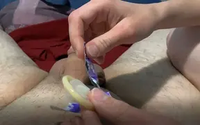 She jerks me off with a condom and I cum inside
