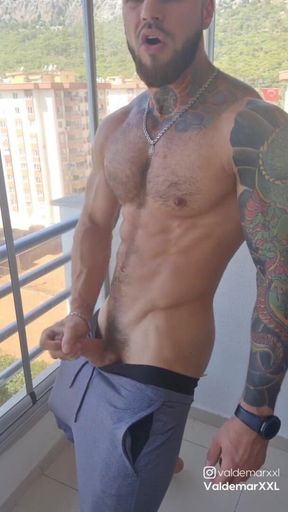 Bald Muscle Stud Masturbate at Balcony