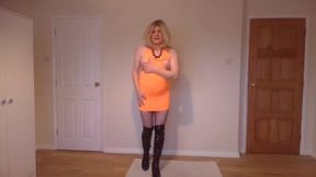 Topless orange dress, fishnets and boots