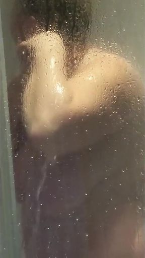Watch Julie in the Shower Getting Ready for Client