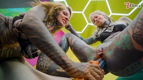 Heavy Inked Lesbians Ride Big Toys in On all fours Butt sex Session